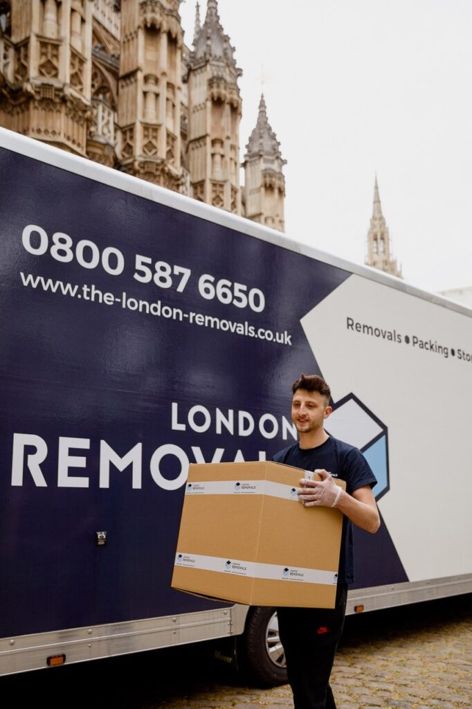 removals man carrying a box